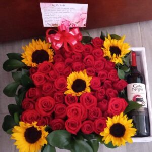 caja por 5 girasoles, rosas y vino