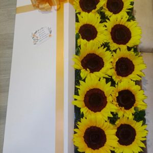 Caja por 12 girasoles con ferrero por 8